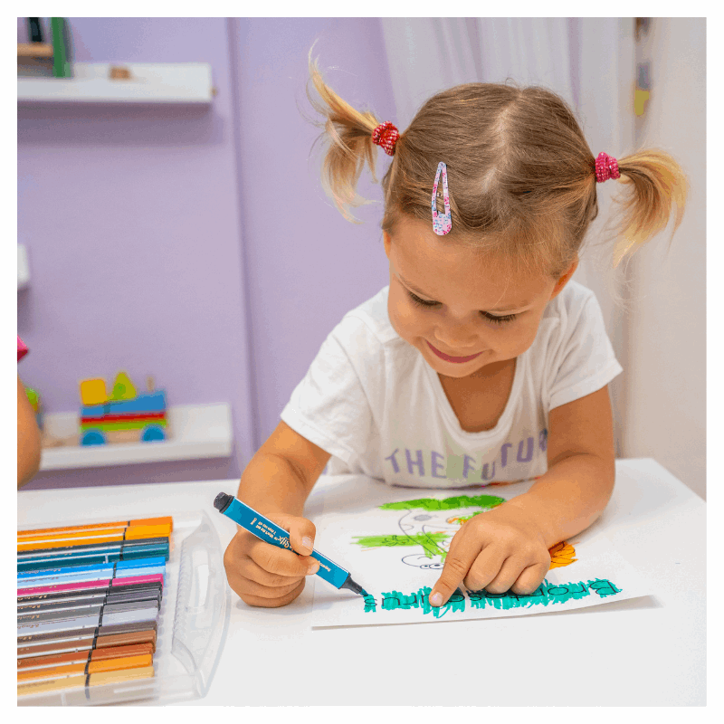 girl coloring with magic stix