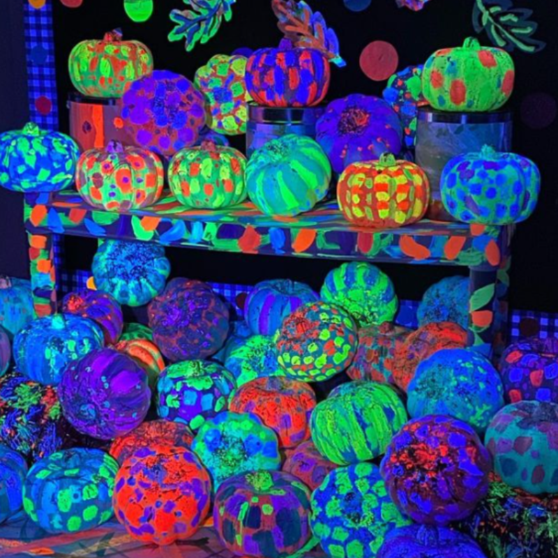 glowing neon painted pumpkins 